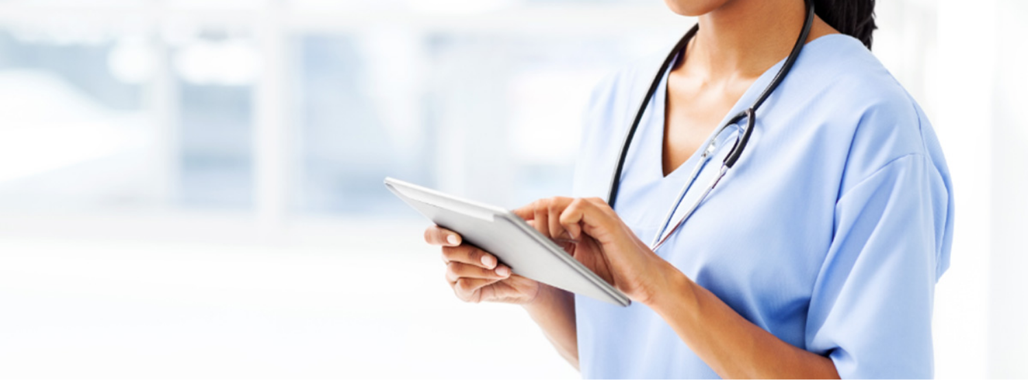 Female Doctor Checks Tablet 
