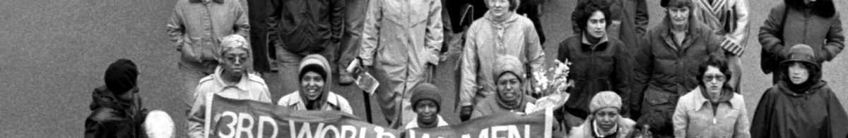 black and white photo of marching protestors