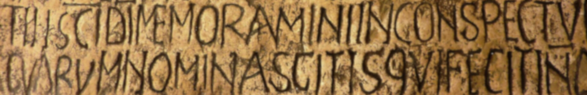 latin script carved into stone